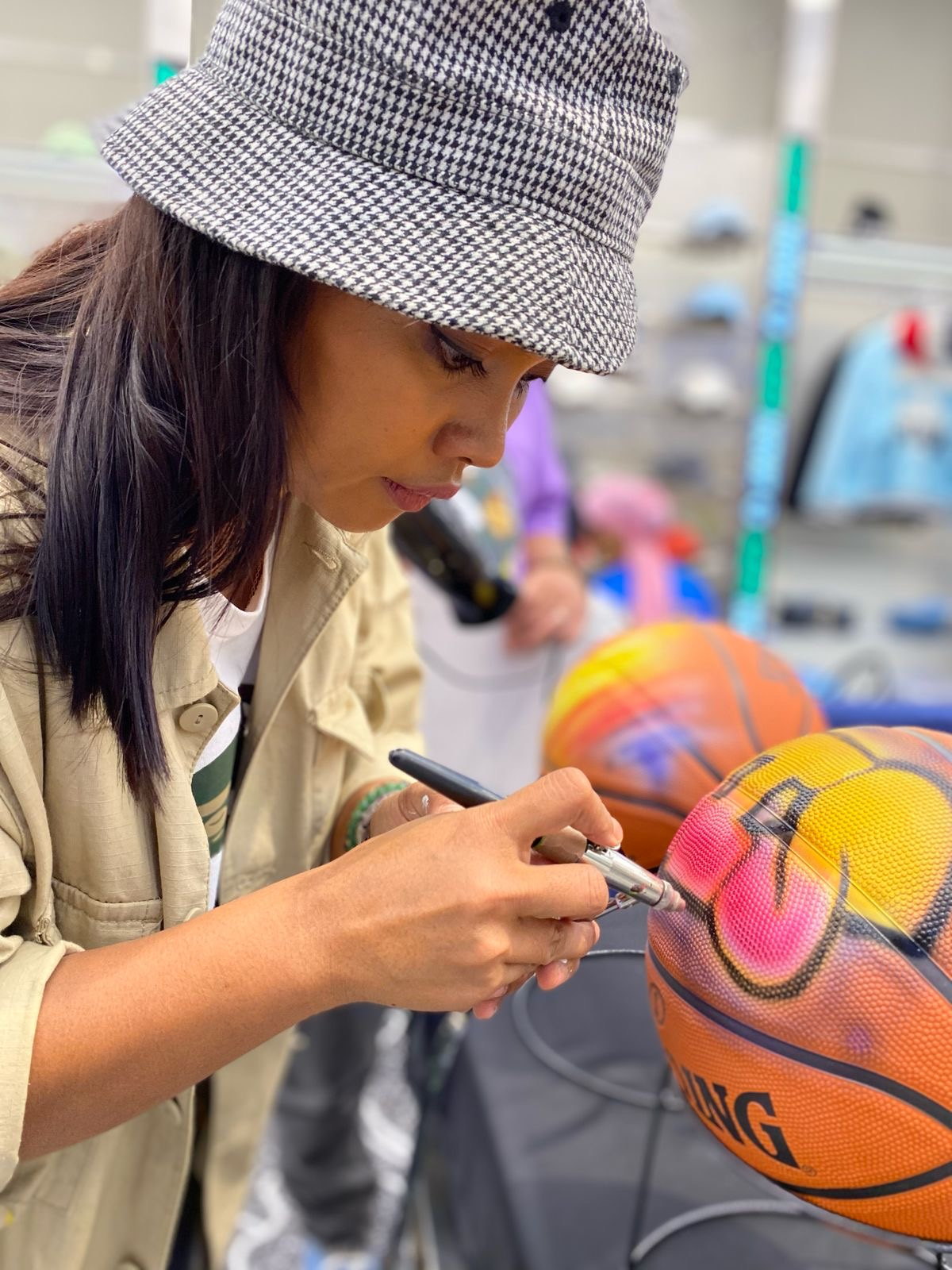 Ella lettering a basketball