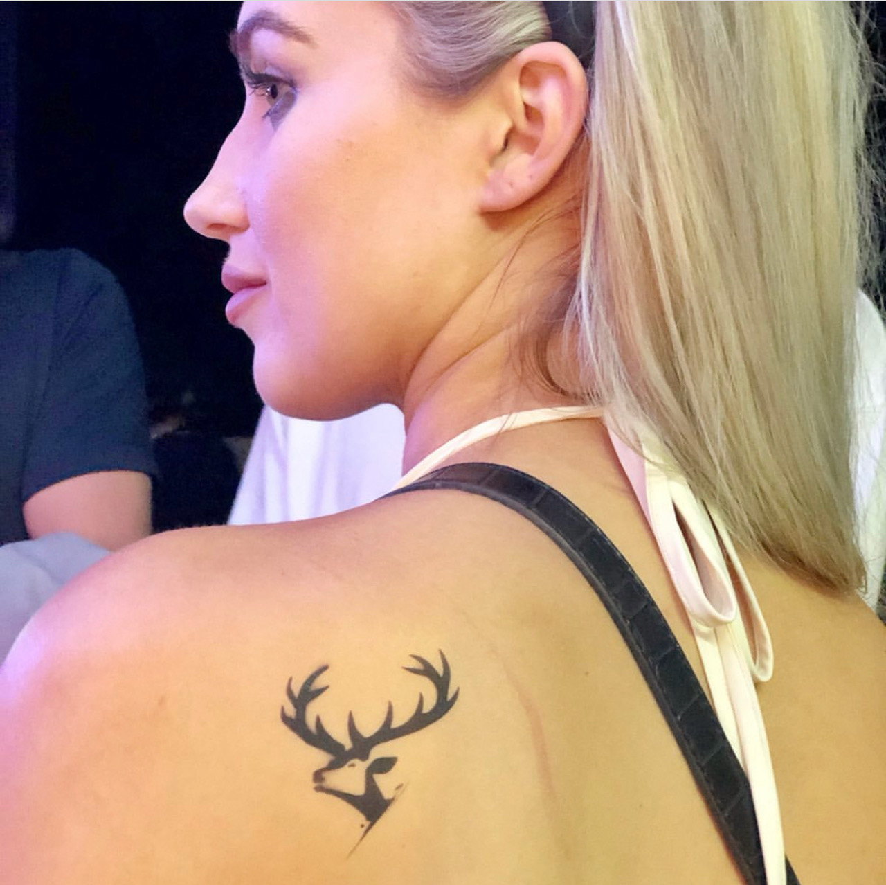 Airbrushed stag tattoo on a shoulder