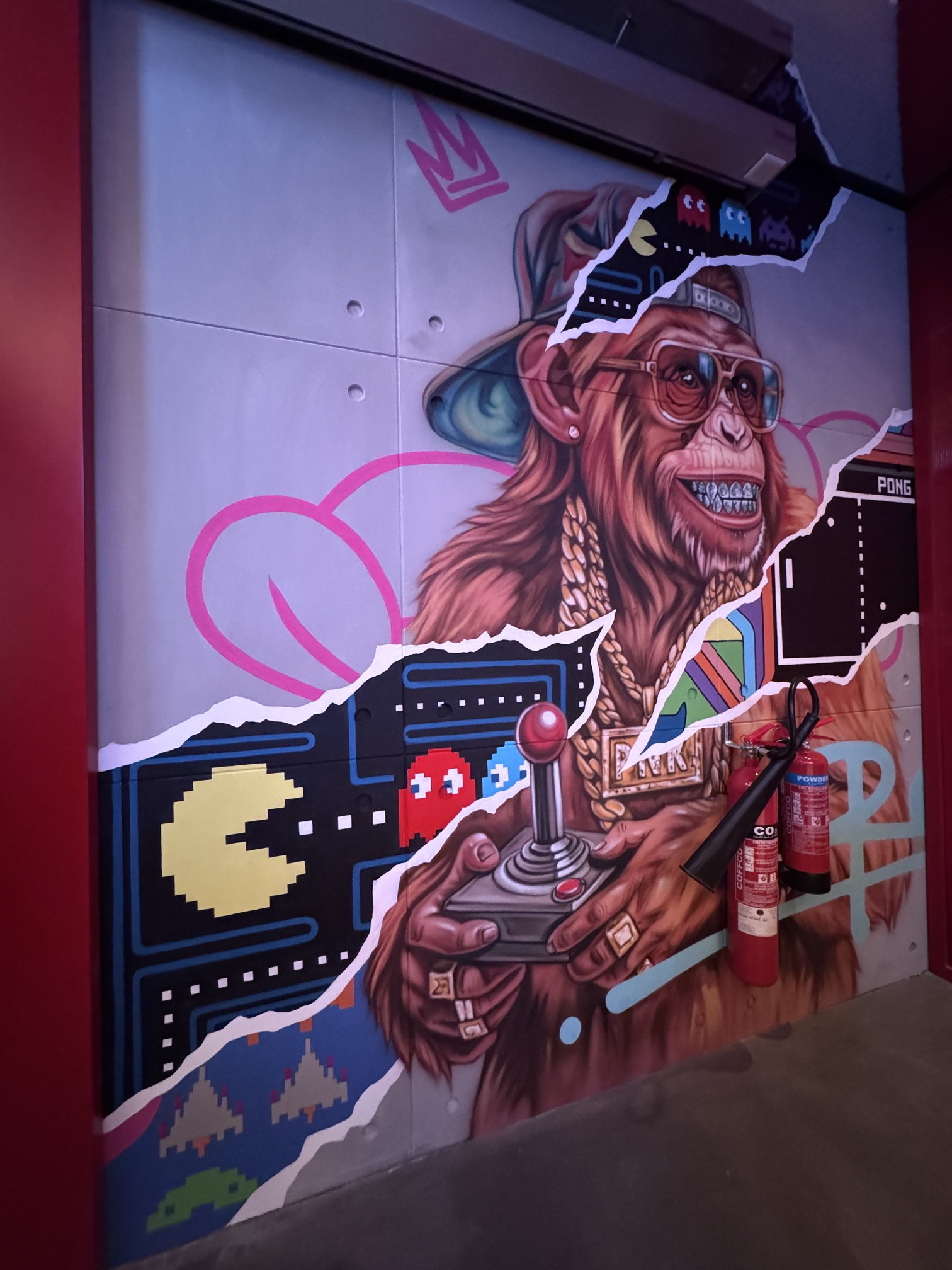 Airbrushed portrait with Pac-Man ghosts at Brass Monkey, Motor City