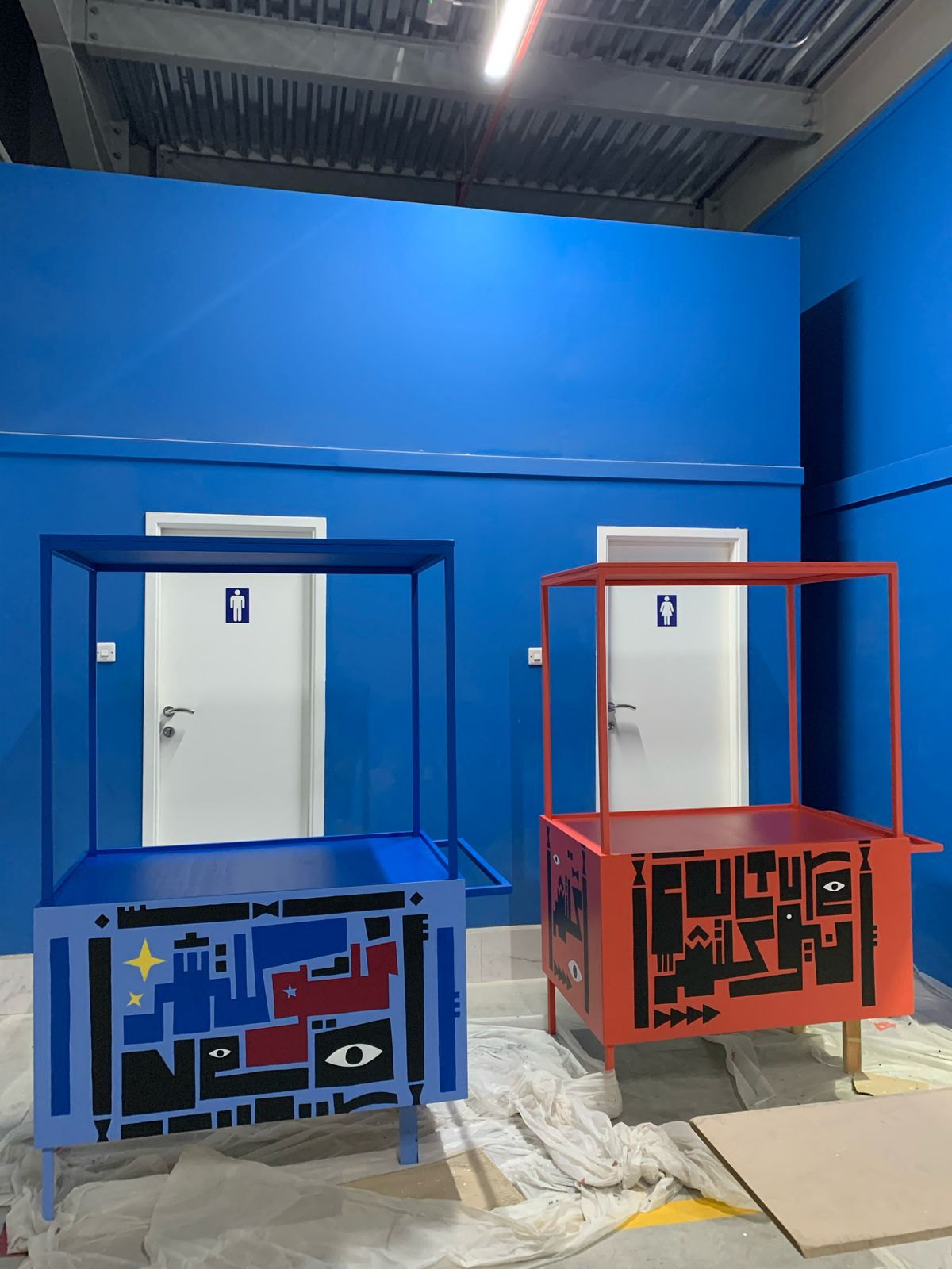 Red and blue BRED cart in the workshop