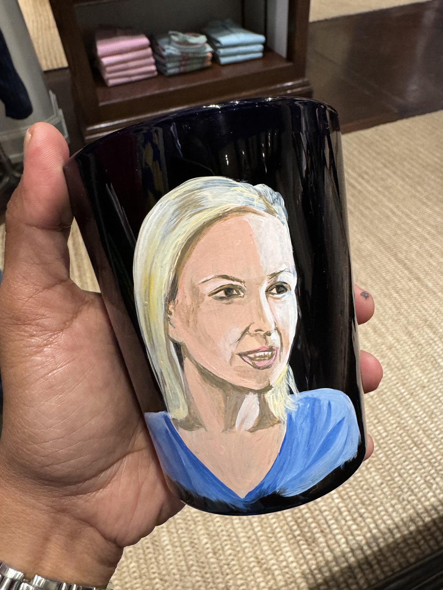 Woman's portrait painted on a candle jar