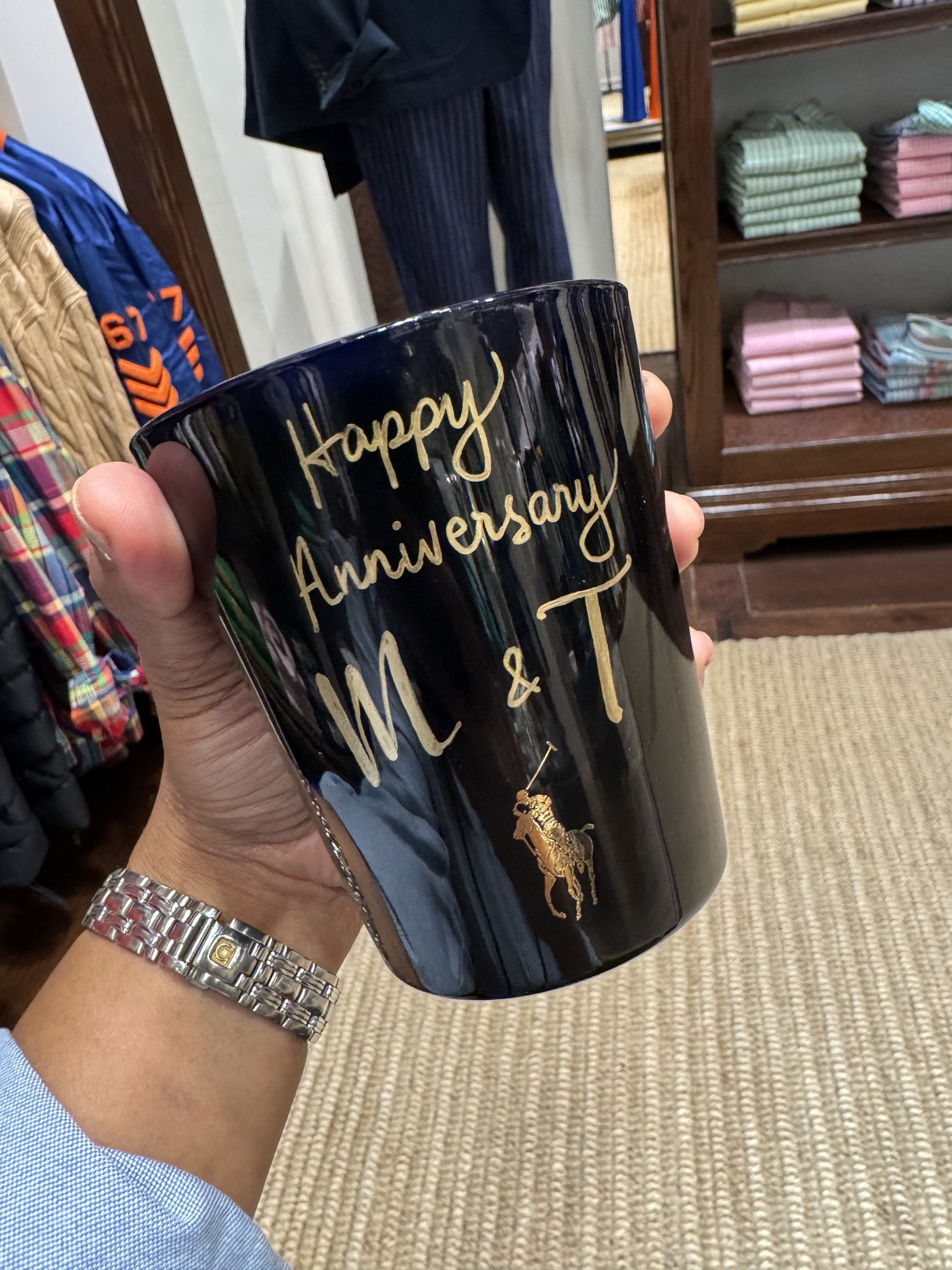 'Happy Anniversary' lettered on a candle jar