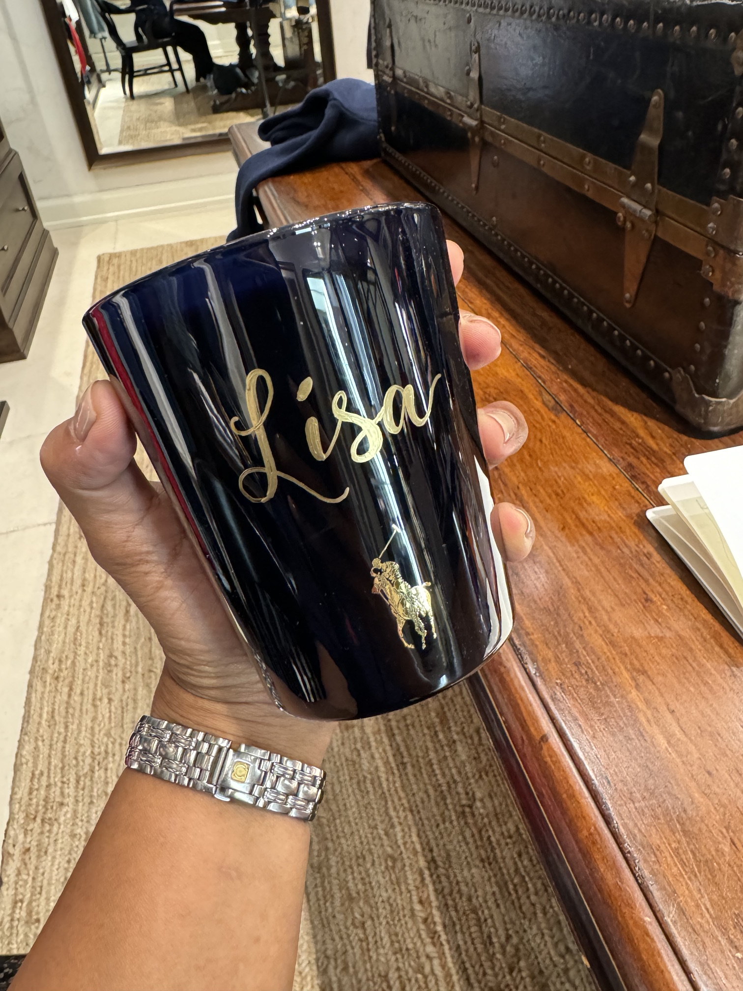 'Lisa' lettered on a candle jar