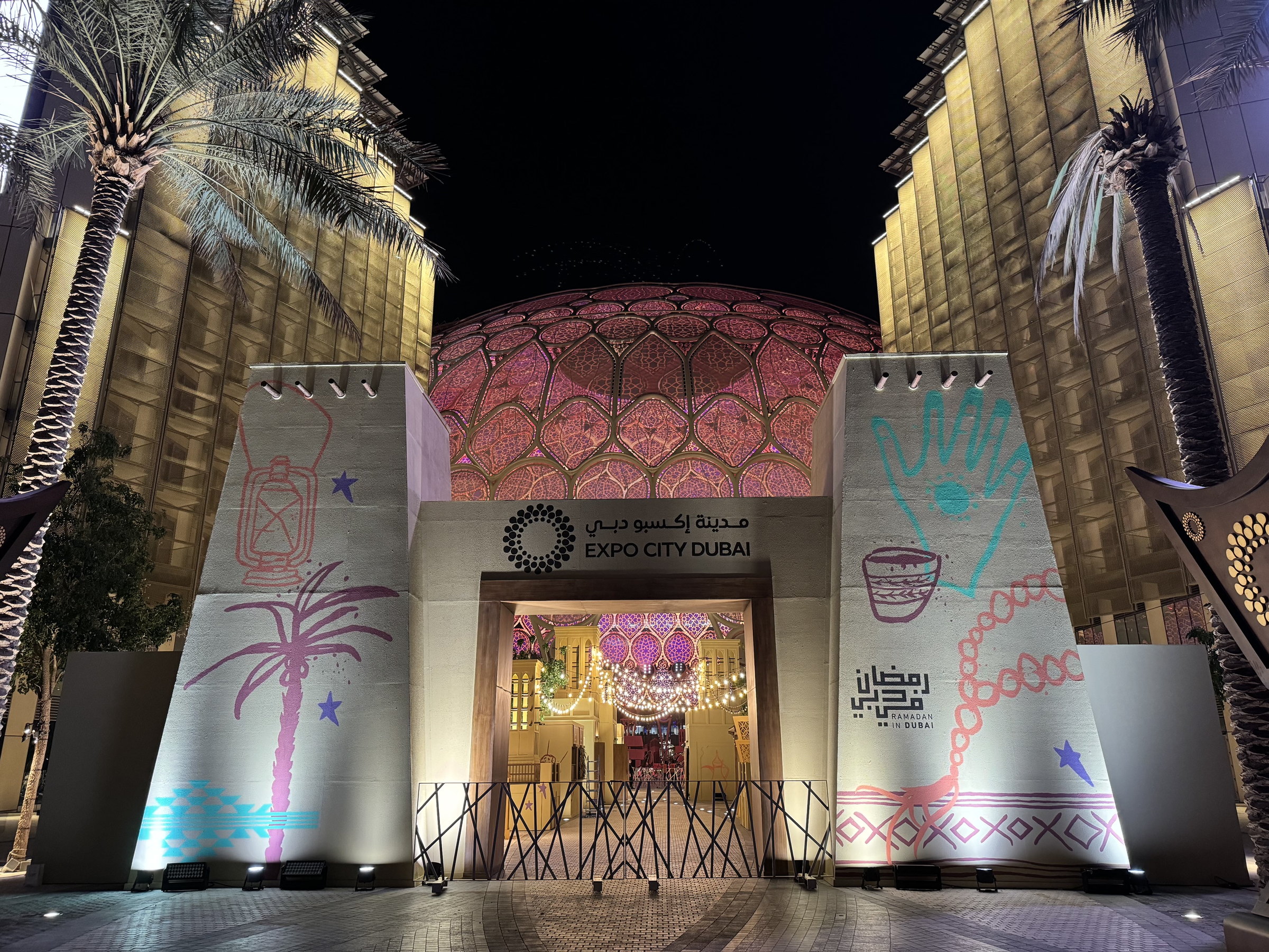 Painted festival wall at Hai Ramadan, Expo City Dubai, at dusk