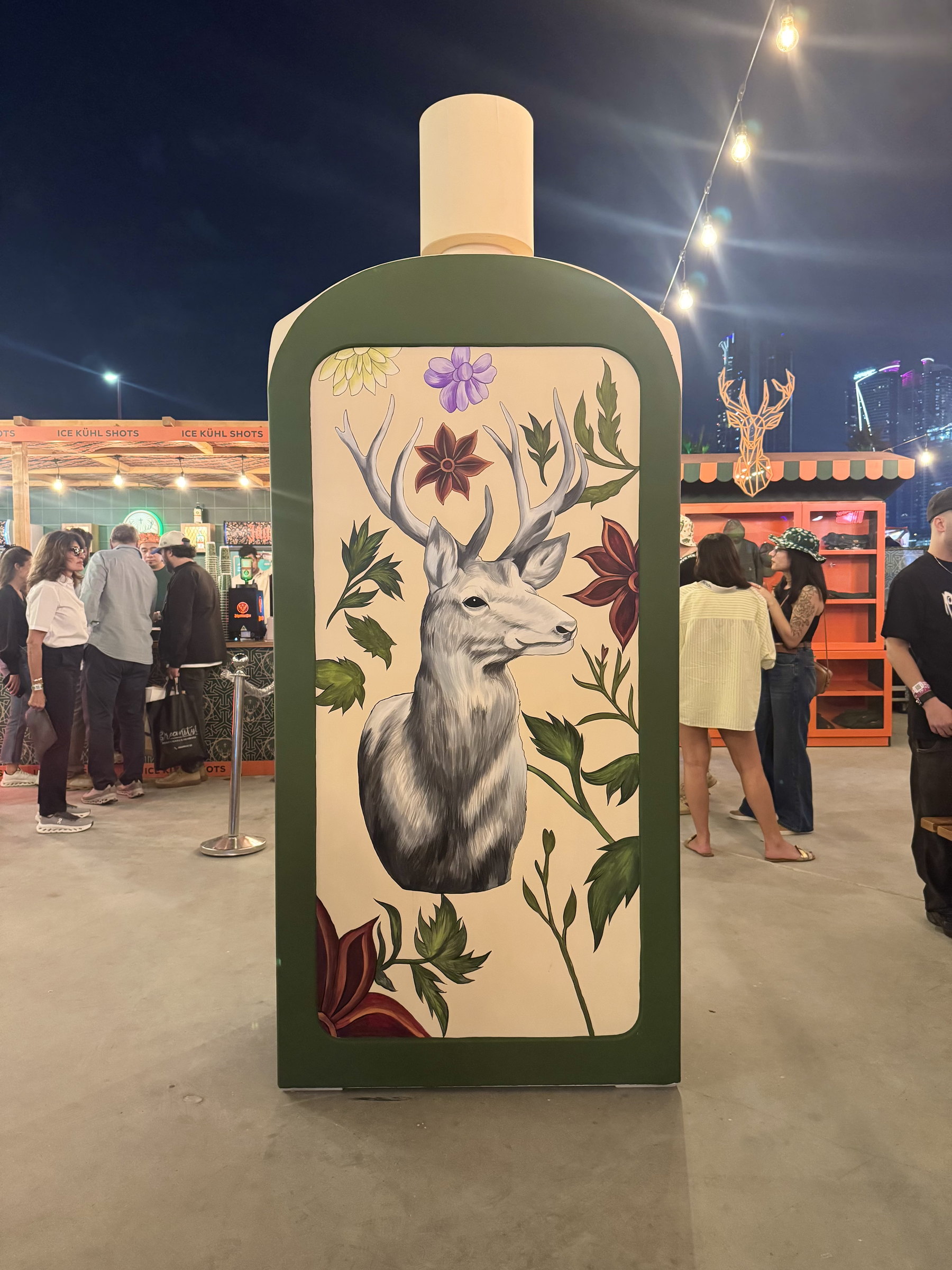 The finished Jägermeister bottle with stag and wildflowers
