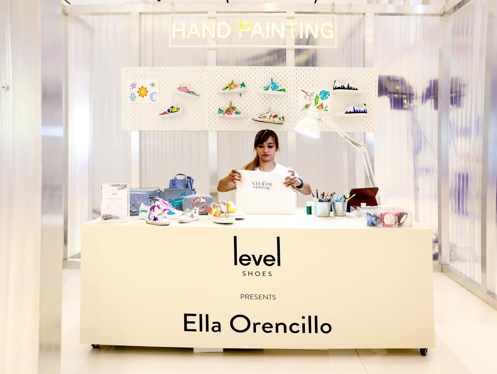 The Personalisation Hub counter at Level Shoes with the 'Ella Orencillo' sign