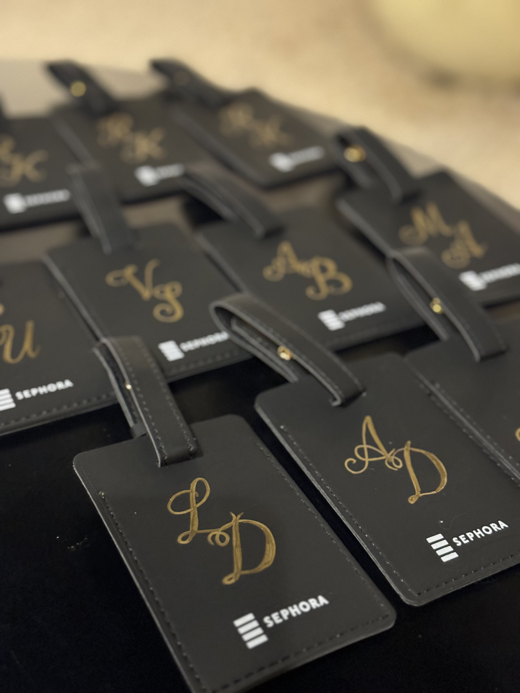 Monogrammed luggage tags laid out