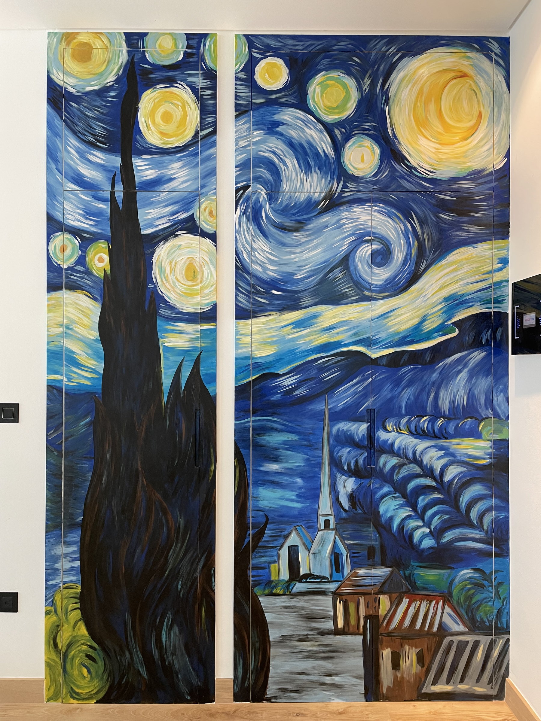 Van Gogh's Starry Night painted across double doors