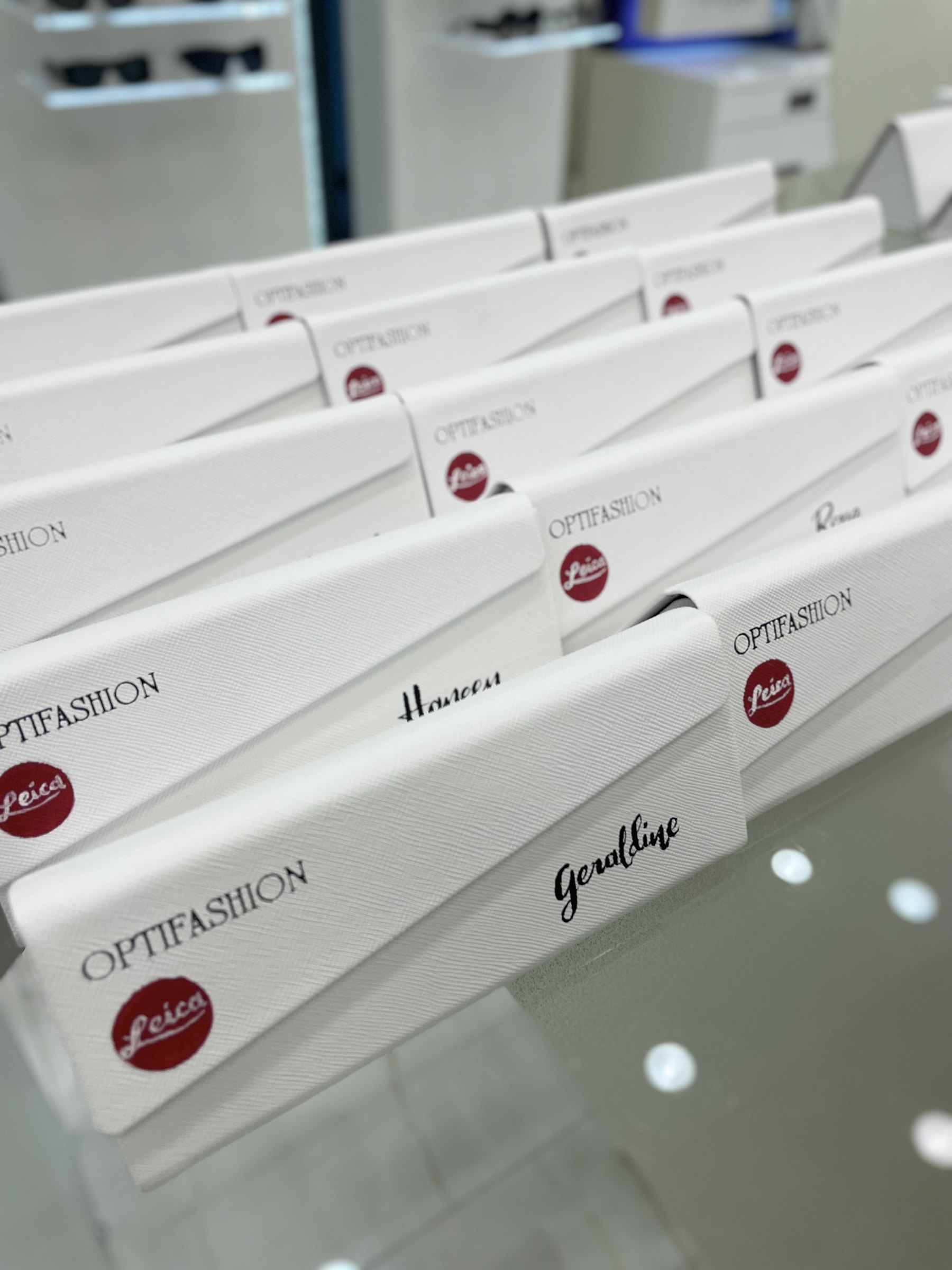 A row of lettered sunglass cases