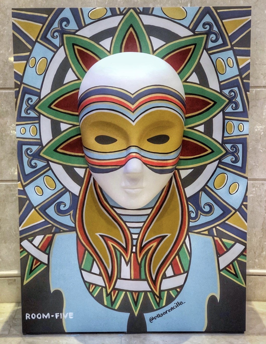 Painted carnival mask with a floral headdress